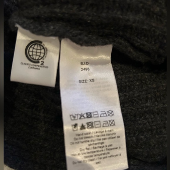 GANNI Cutout Ruffled Ribbed Open Back Wool-blend Sweater - Picture 12 of 12